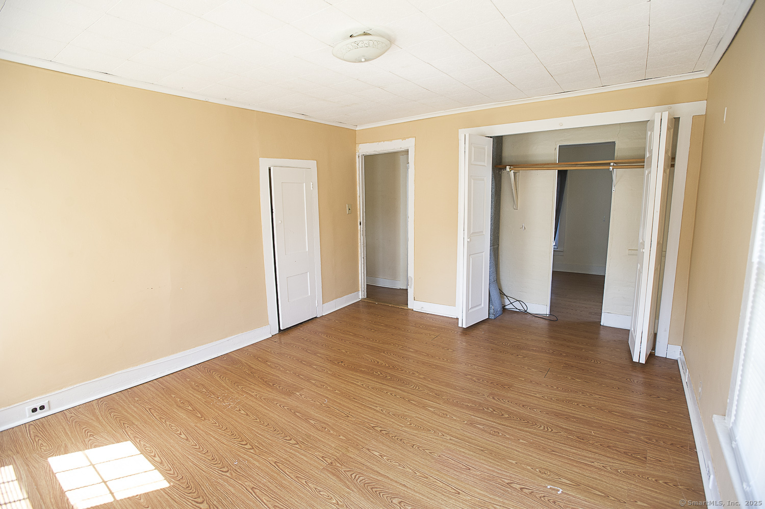 685 Kent Road New Milford, CT 06755 - Photo 33 of 34 a view of an empty room with wooden floor