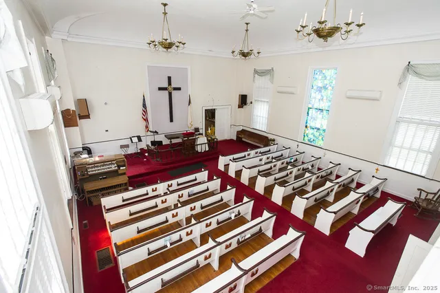 a view of a kitchen with granite countertop a sink and dishwasher