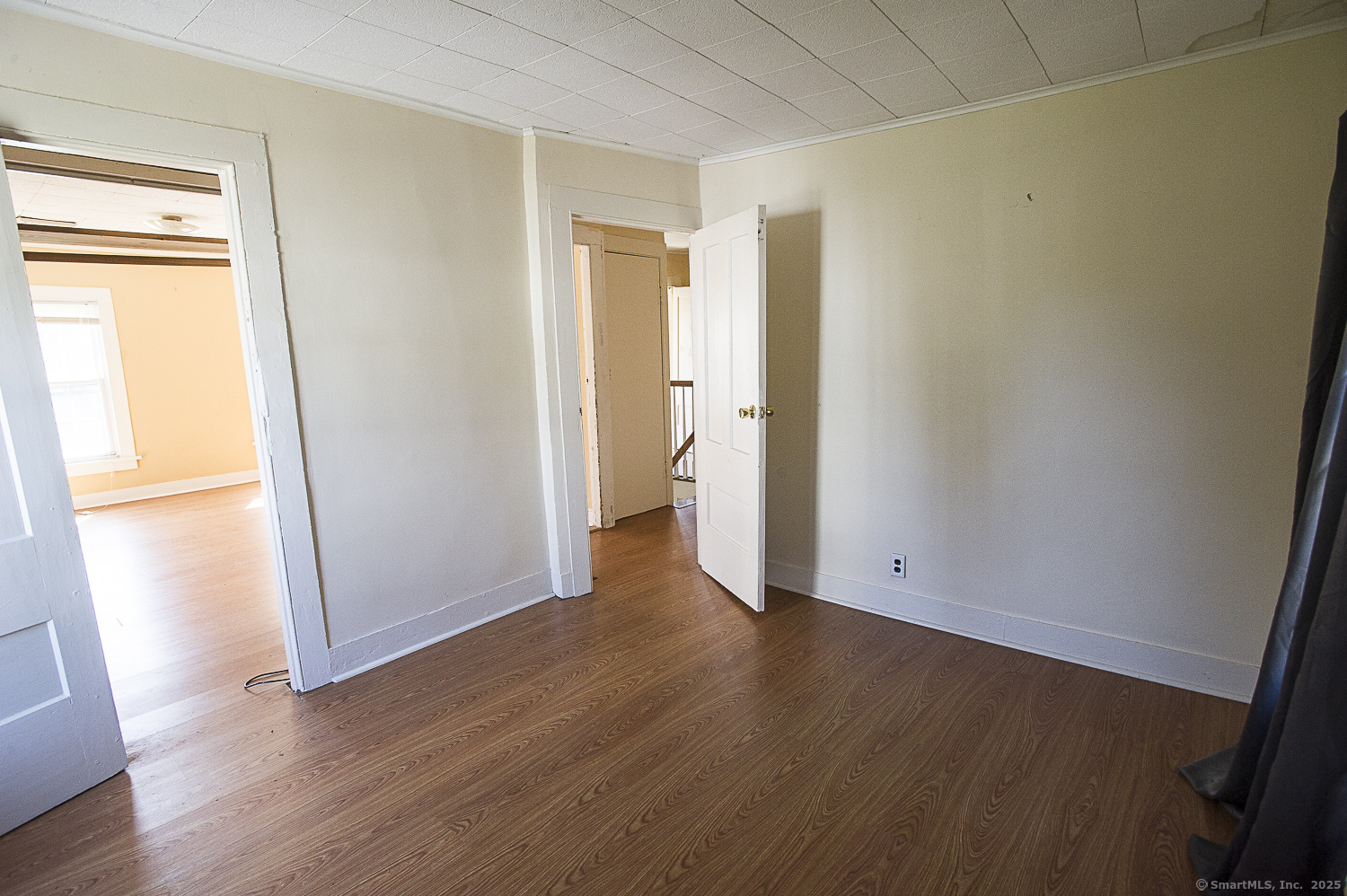 685 Kent Road New Milford, CT 06755 - Photo 10 of 34 a view of an empty room with wooden floor and a window