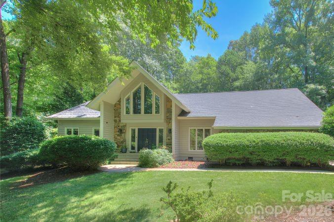 3408 Providence Manor Road Charlotte, NC 28270 - Photo 2 of 39 a front view of a house with a yard