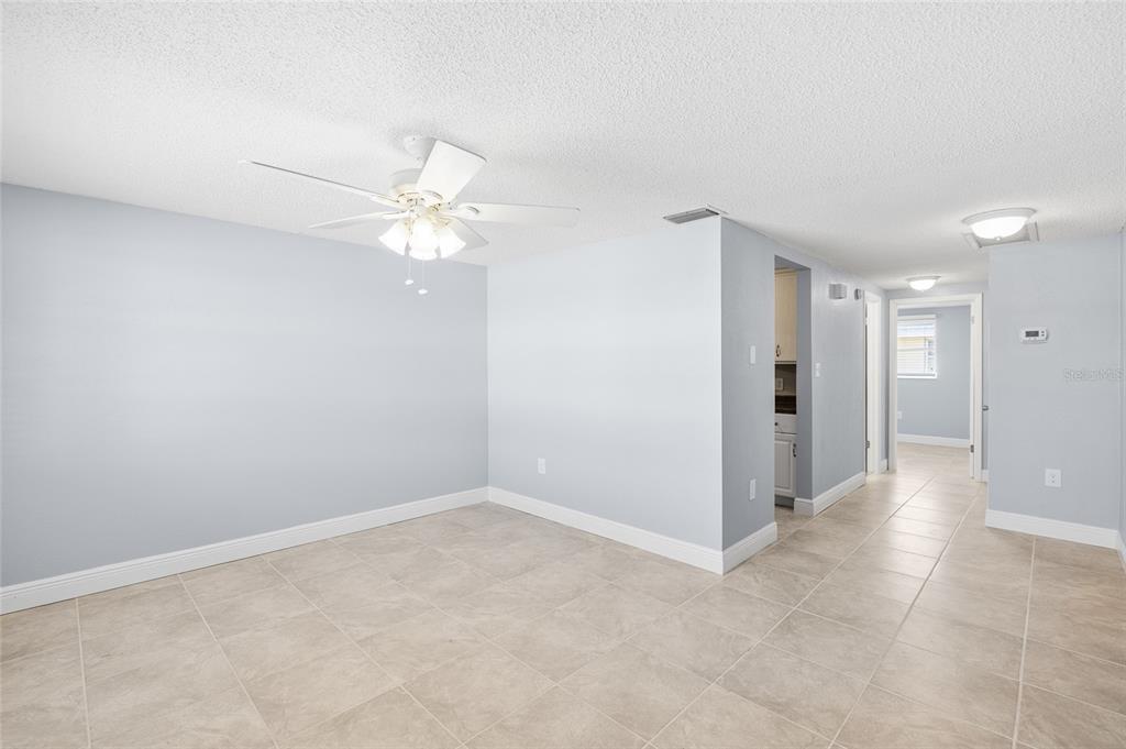 4948 Getner Street New Port Richey, FL 34652 - Photo 7 of 20 a view of an empty room with a fan