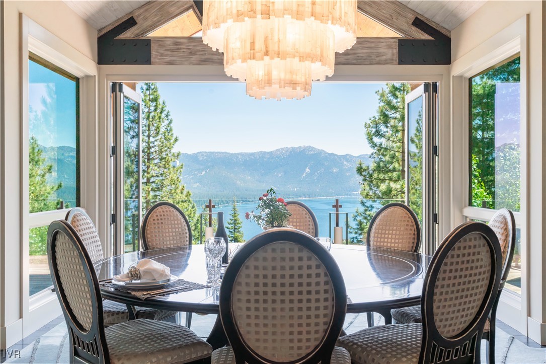 475 Tuscarora Road Crystal Bay, NV 89402 - Photo 10 of 49 a view of a balcony dining table and chairs