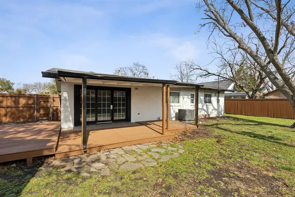 a house with yard in front of it