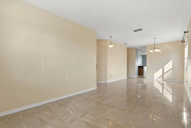 an empty room with a bathroom