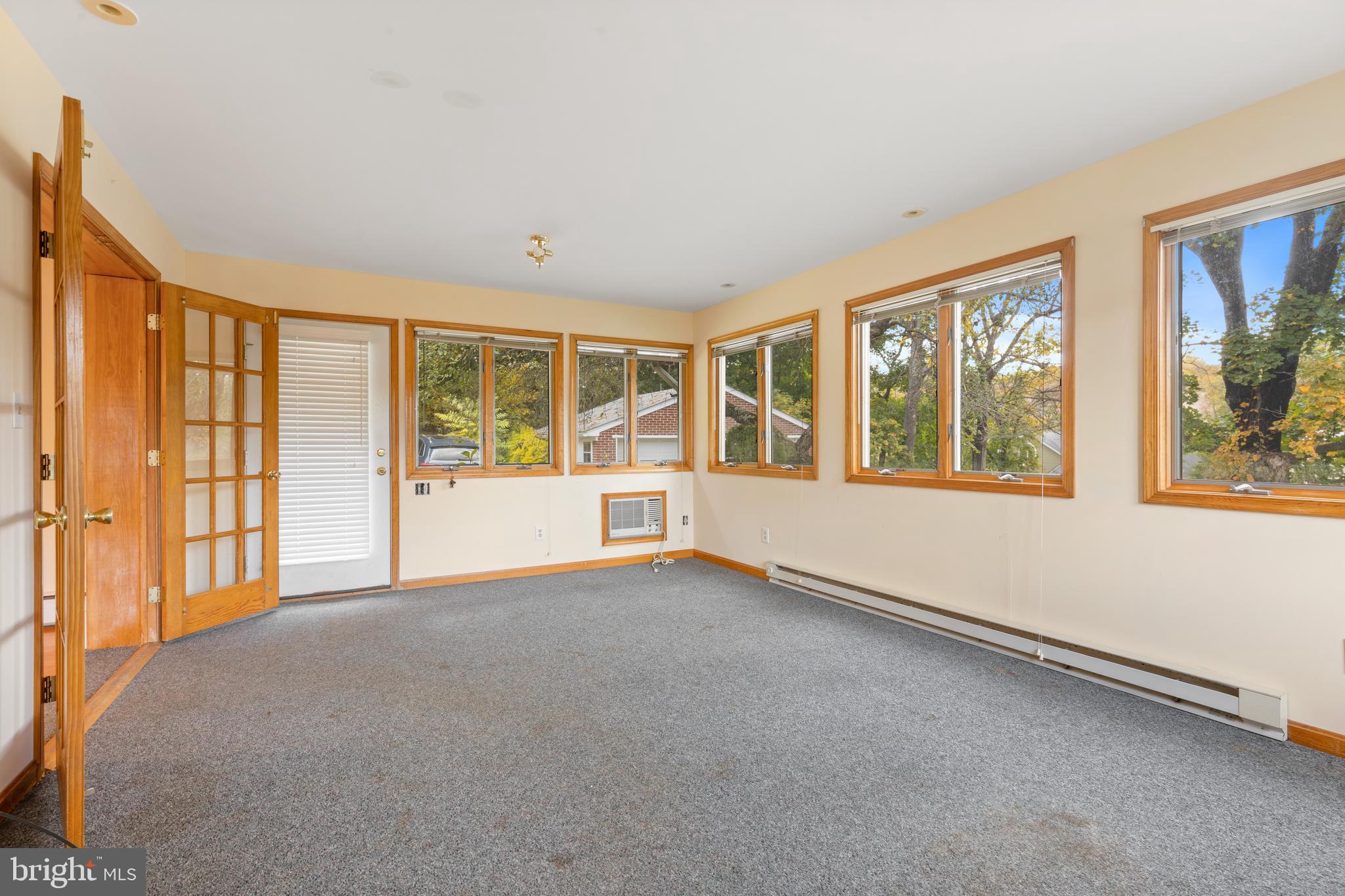 14914 Falls Road Reisterstown, MD 21136 - Photo 11 of 44 Large sunroom with casement windows