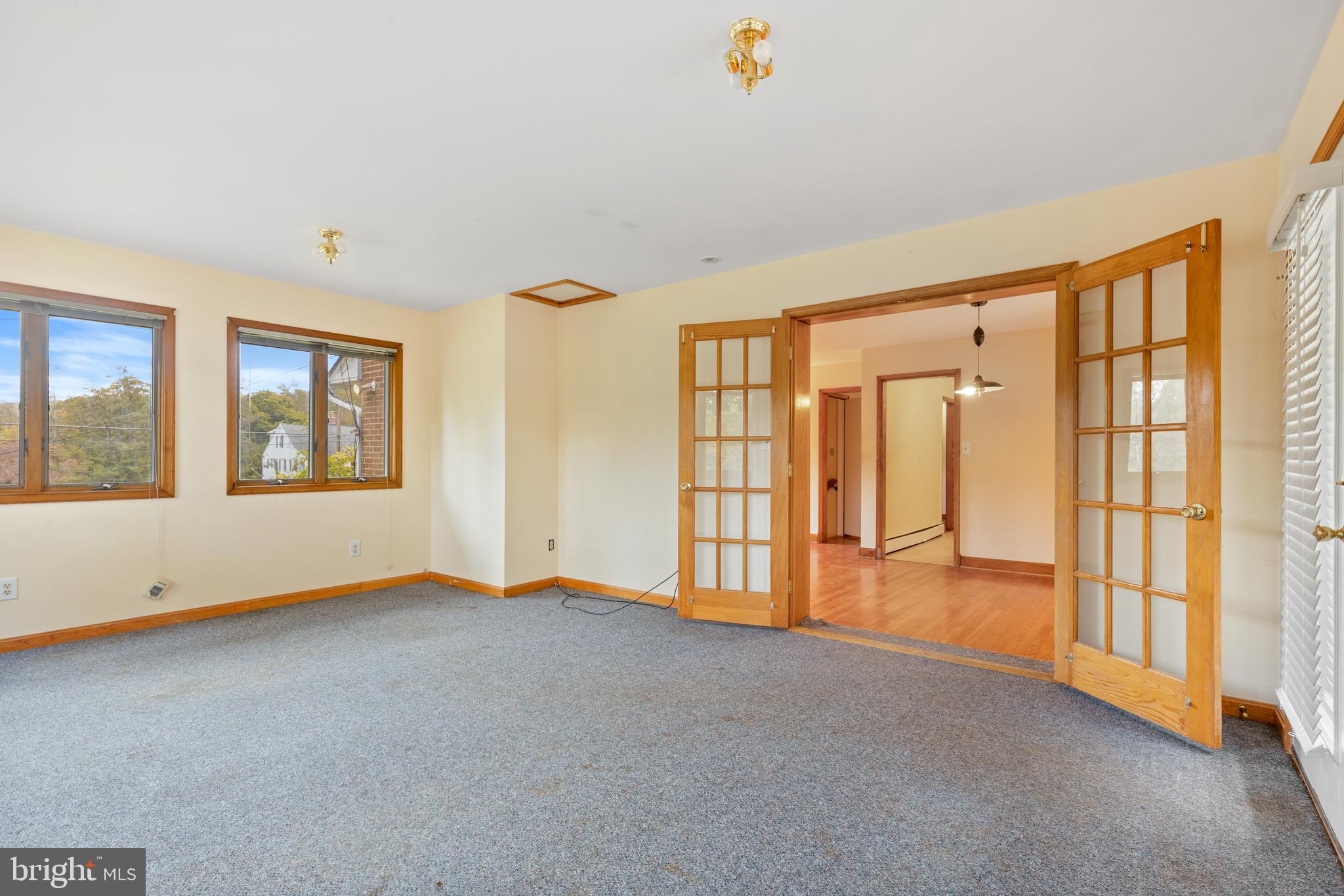 14914 Falls Road Reisterstown, MD 21136 - Photo 13 of 44 Lovely wood french doors from DR to sunroom