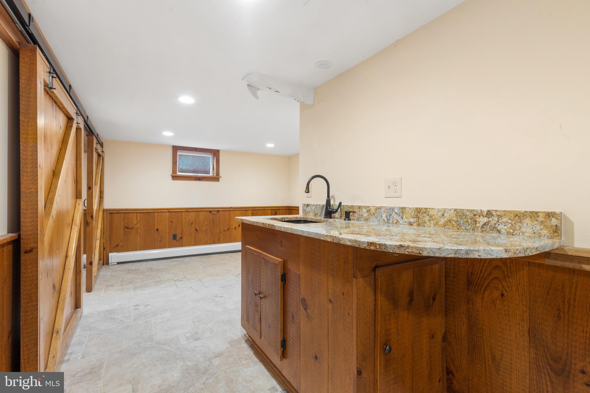 14914 Falls Road Reisterstown, MD 21136 - Photo 31 of 44 Wetbar in lower level