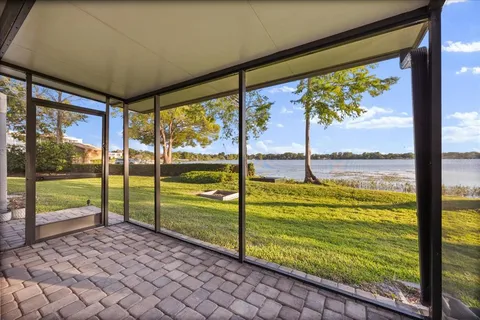 a view of an empty room with a large window