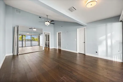 a bathroom with a sink vanity mirror and toilet