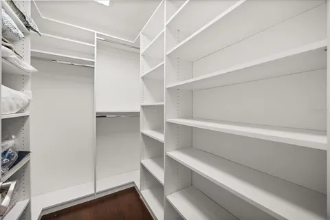 a view of a lake with couches and city view