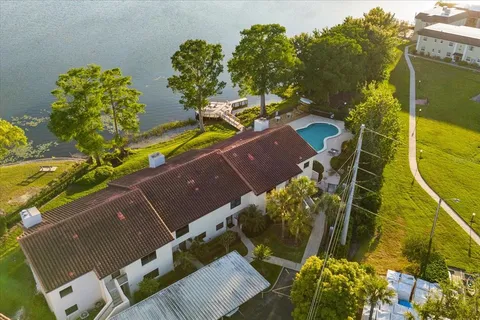 a view of a swimming pool with a lounge chairs