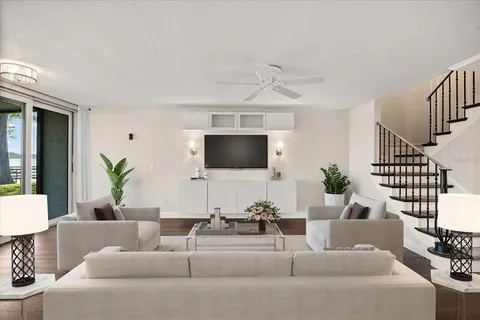 a bedroom with a large bed and a large window