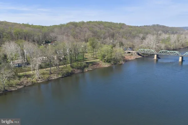 a view of a lake with mountain