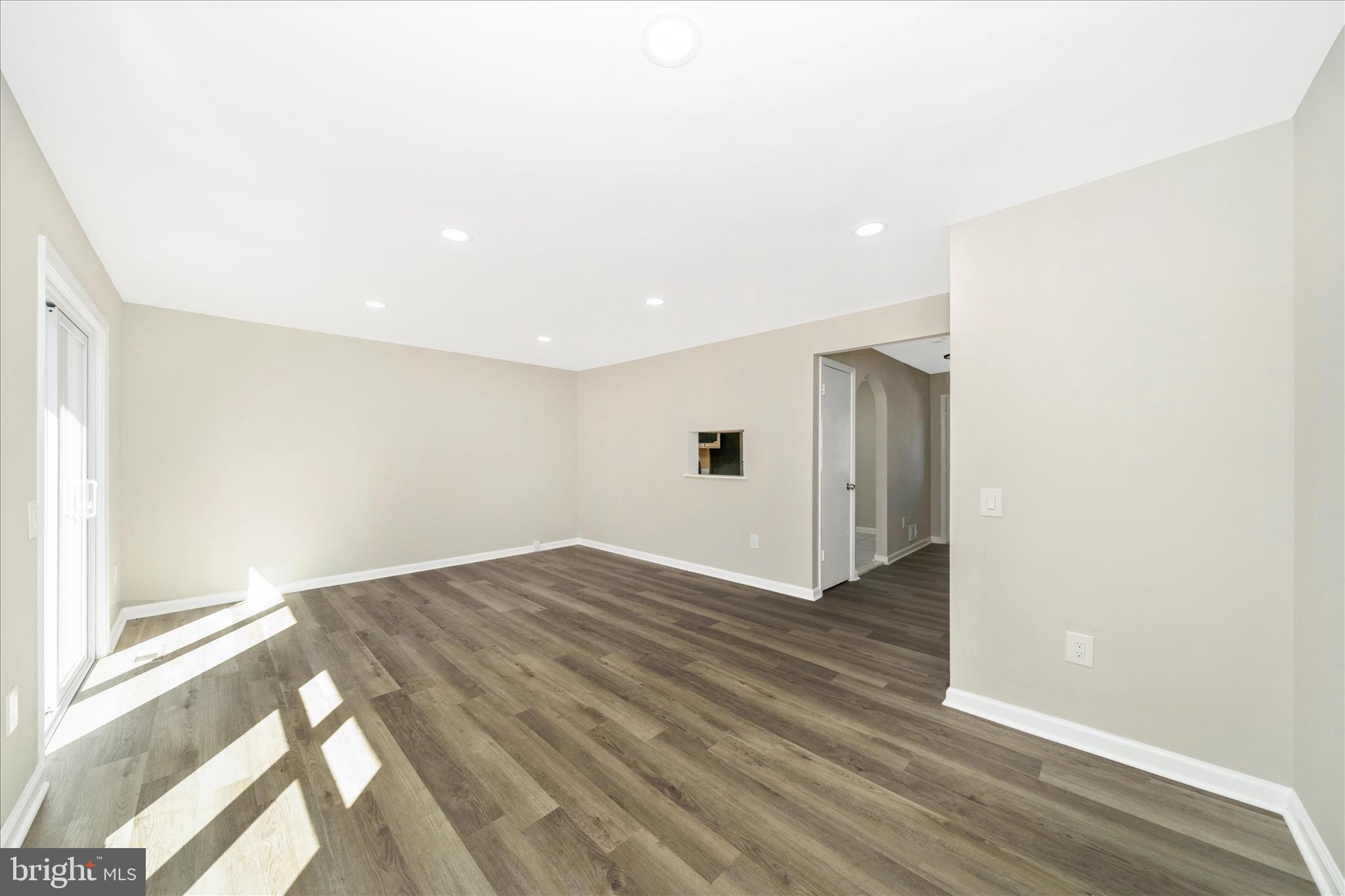 1848 Murdock Court Frederick, MD 21702 - Photo 18 of 54 a view of empty room with wooden floor and fan