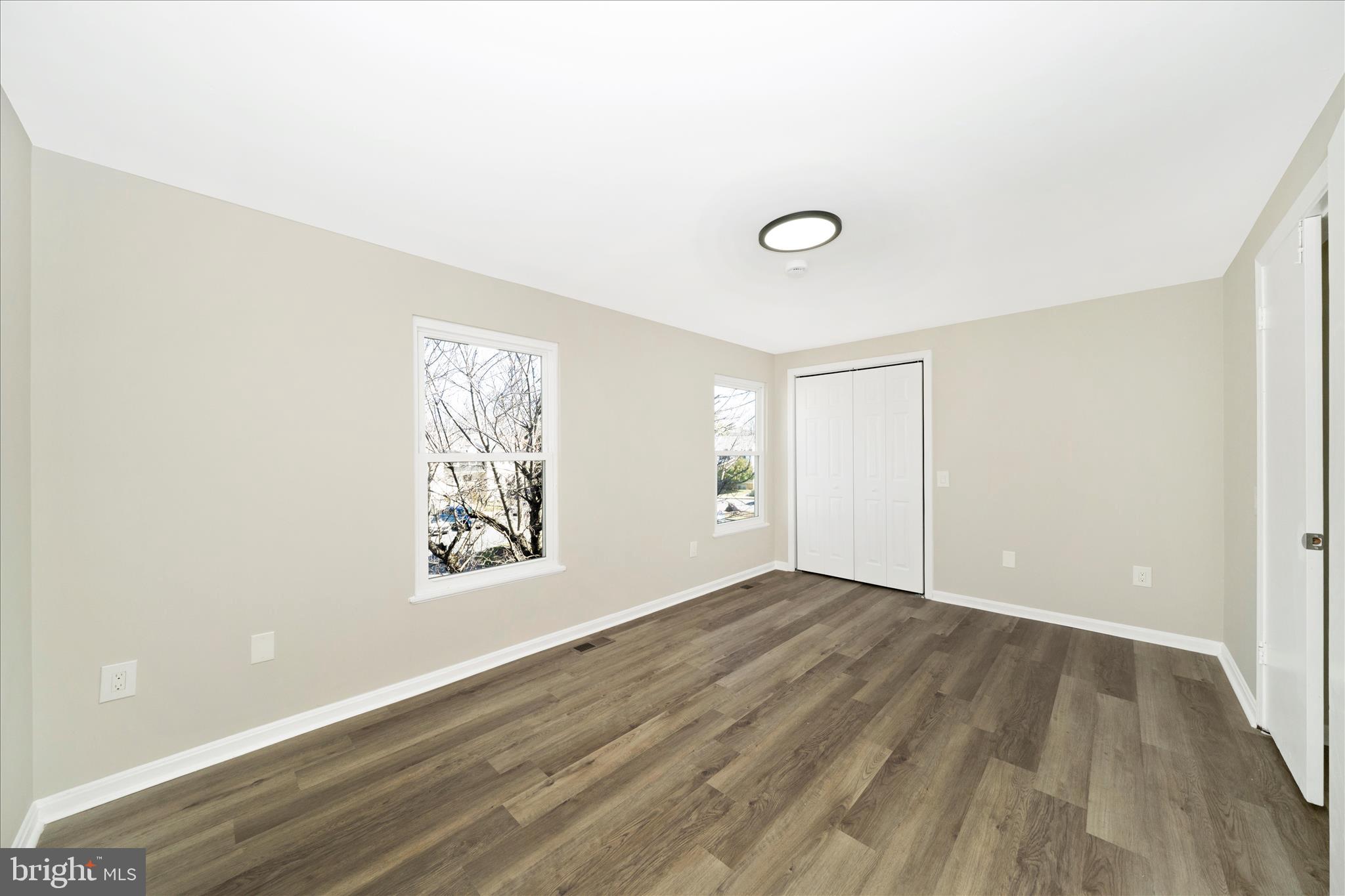 1848 Murdock Court Frederick, MD 21702 - Photo 20 of 54 an empty room with wooden floor and windows