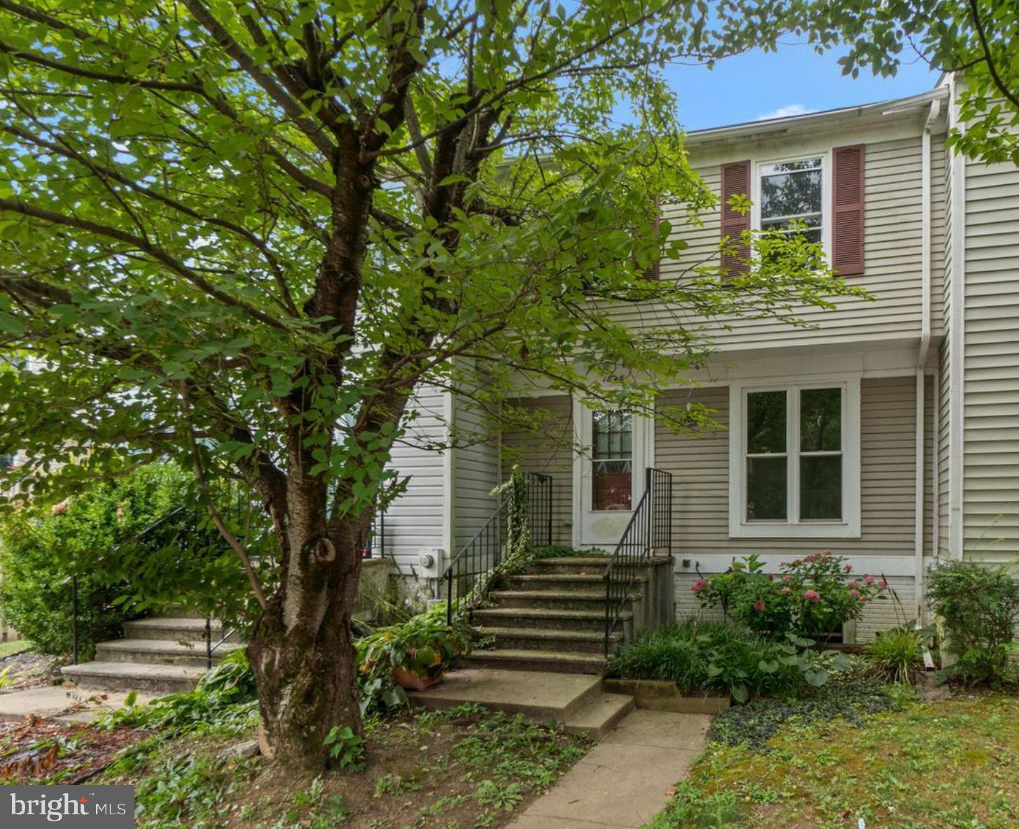1848 Murdock Court Frederick, MD 21702 - Photo 2 of 54 a front view of a house with a garden