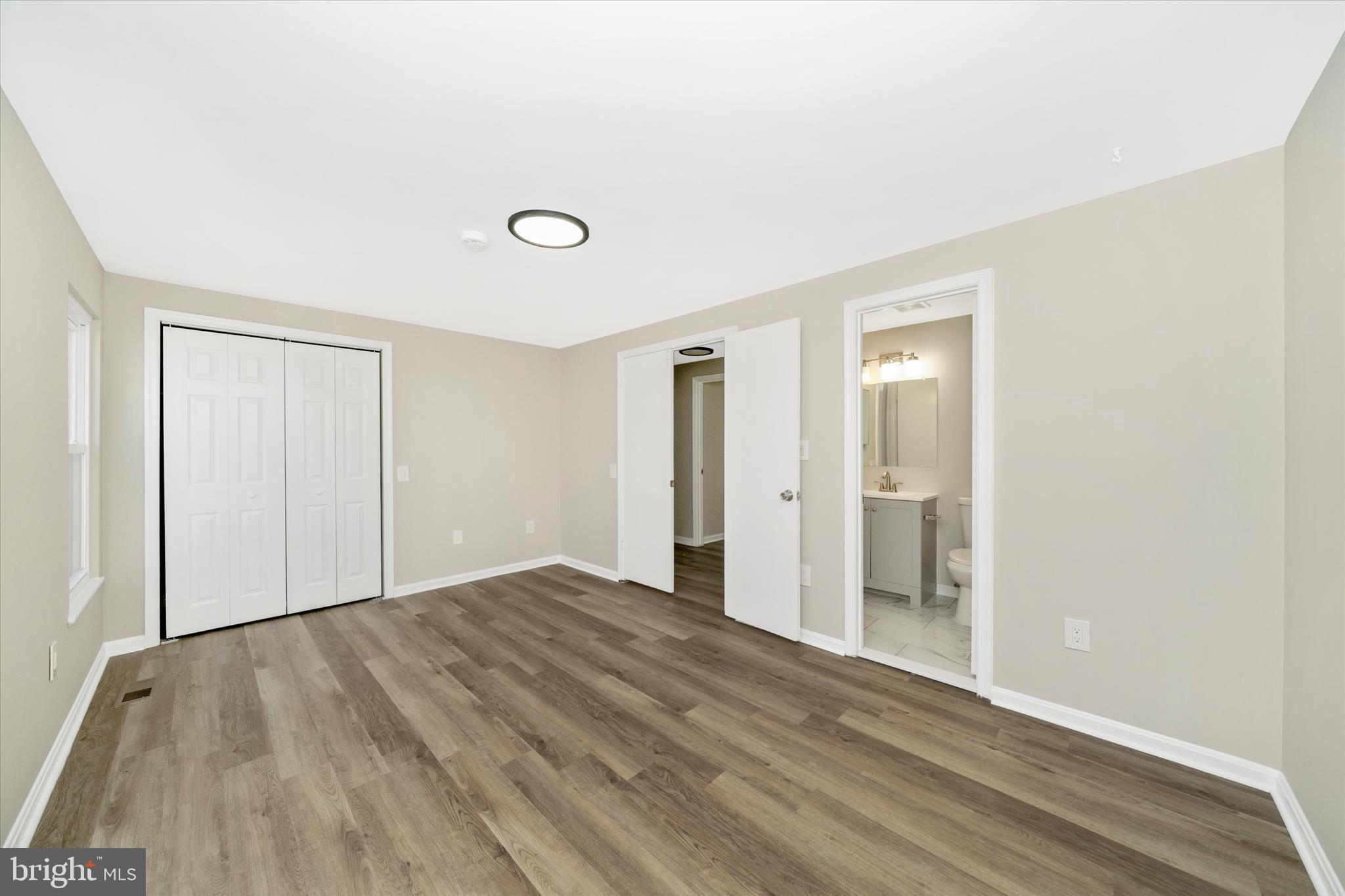 1848 Murdock Court Frederick, MD 21702 - Photo 21 of 54 a view of an empty room with wooden floor and closet