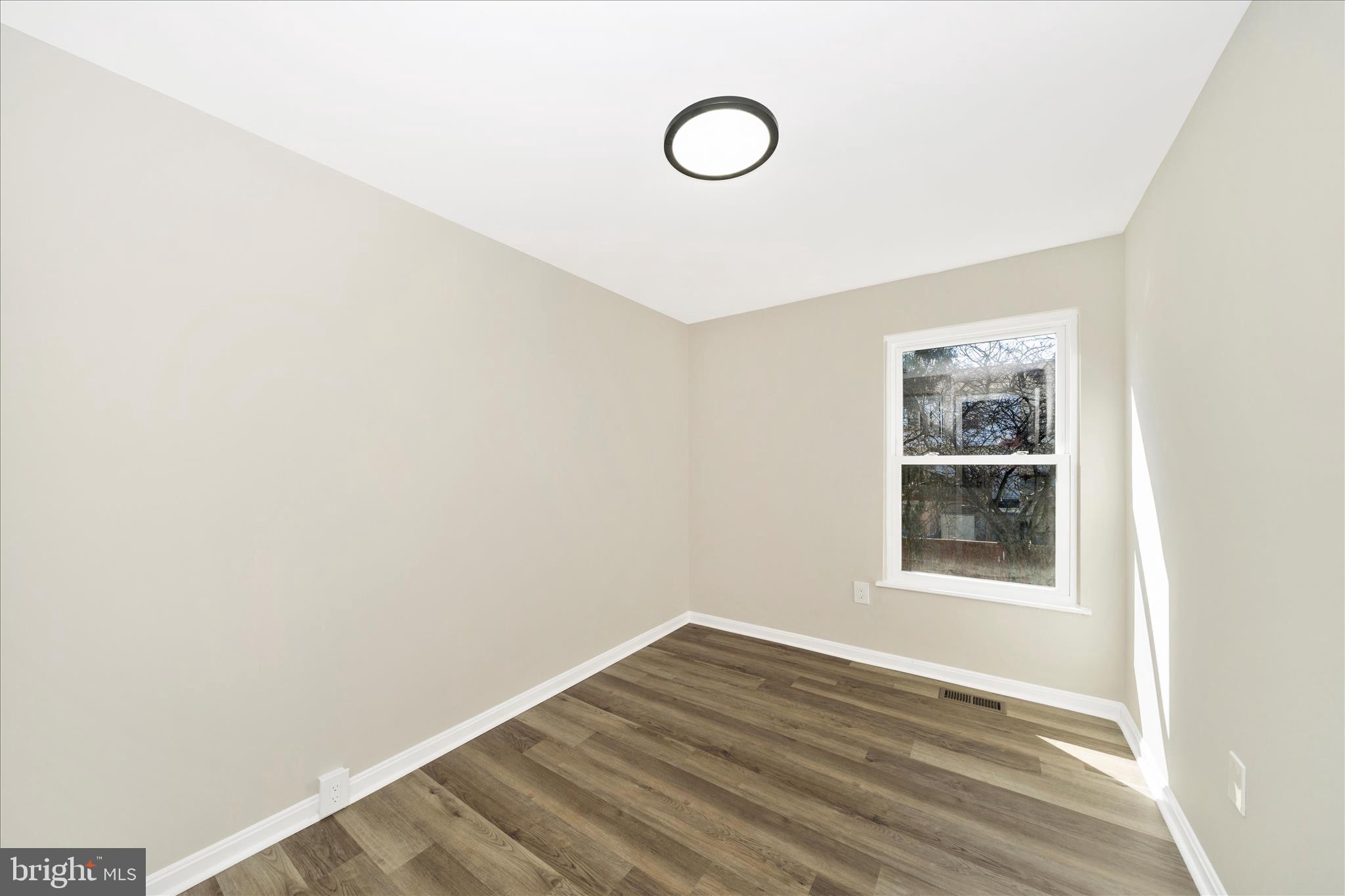 1848 Murdock Court Frederick, MD 21702 - Photo 24 of 54 a view of empty room with wooden floor