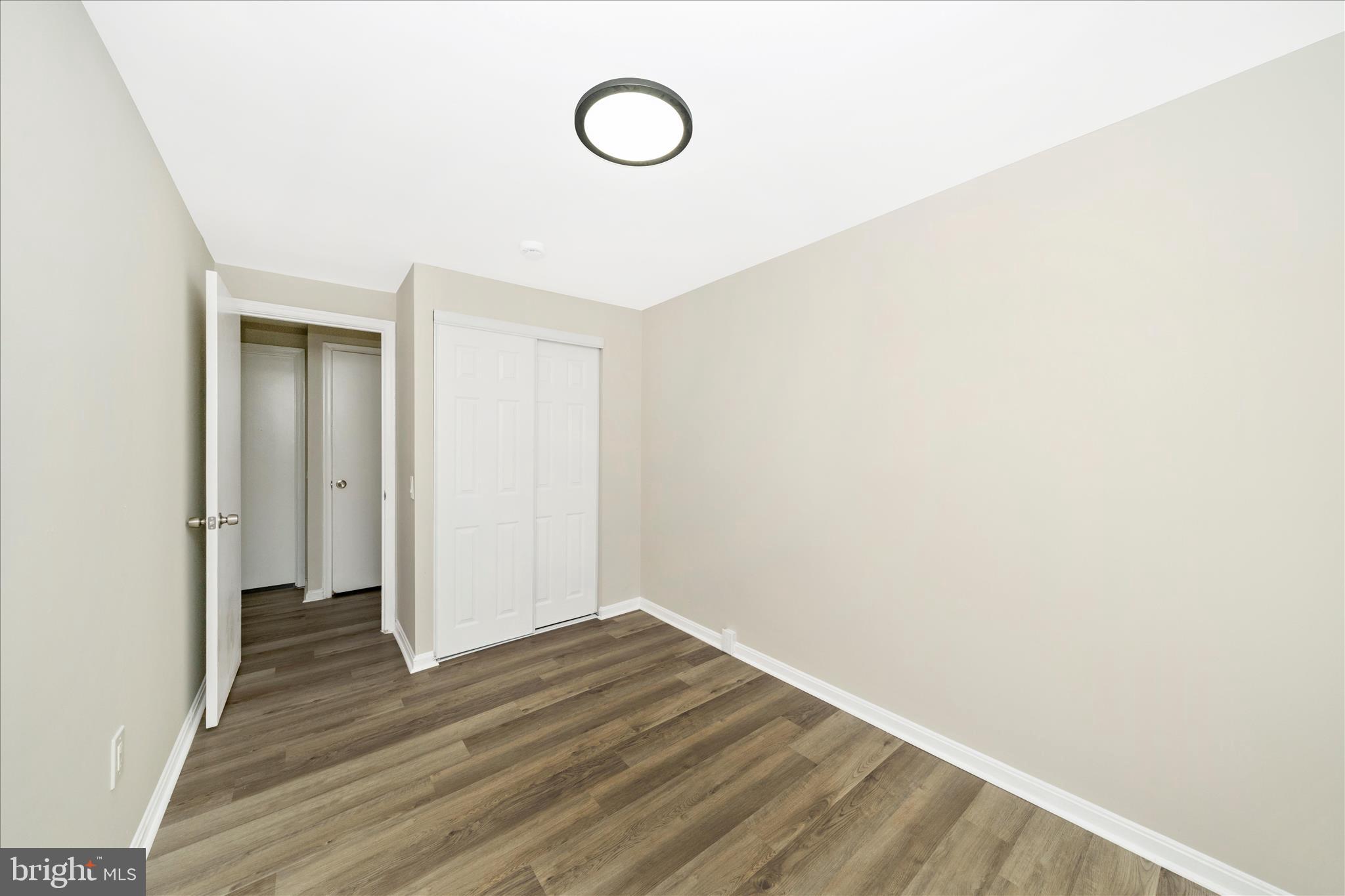 1848 Murdock Court Frederick, MD 21702 - Photo 26 of 54 a view of a room with wooden floor