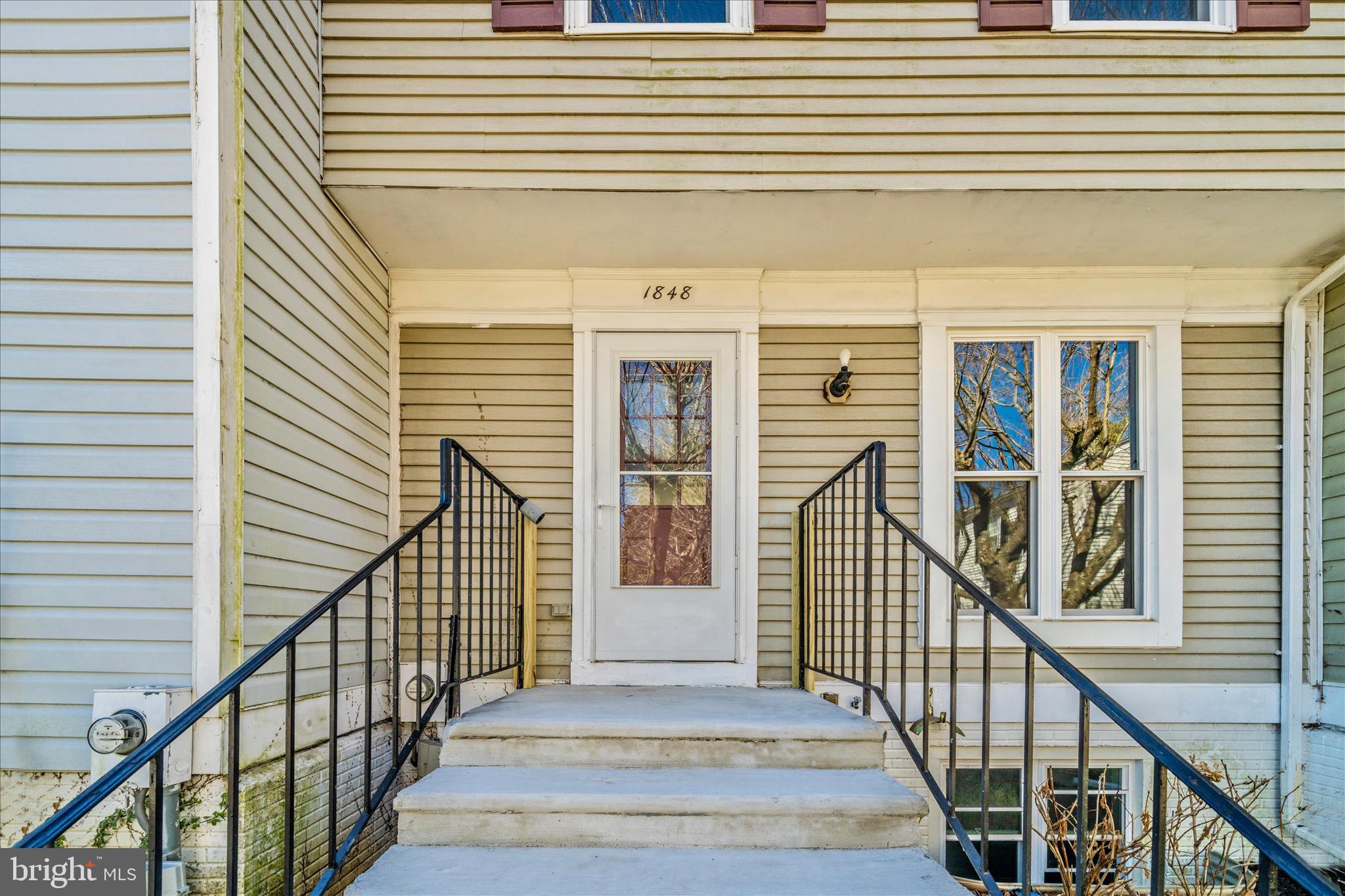 1848 Murdock Court Frederick, MD 21702 - Photo 3 of 54 a view of balcony with wooden floor and stairs