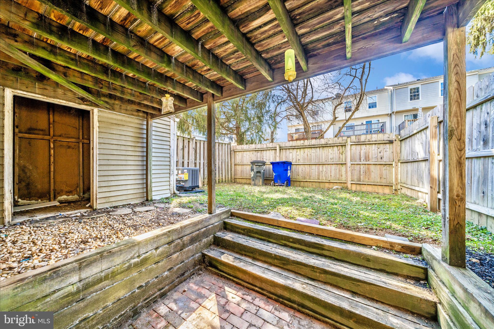 1848 Murdock Court Frederick, MD 21702 - Photo 42 of 54 a view of backyard with tub and wooden fence