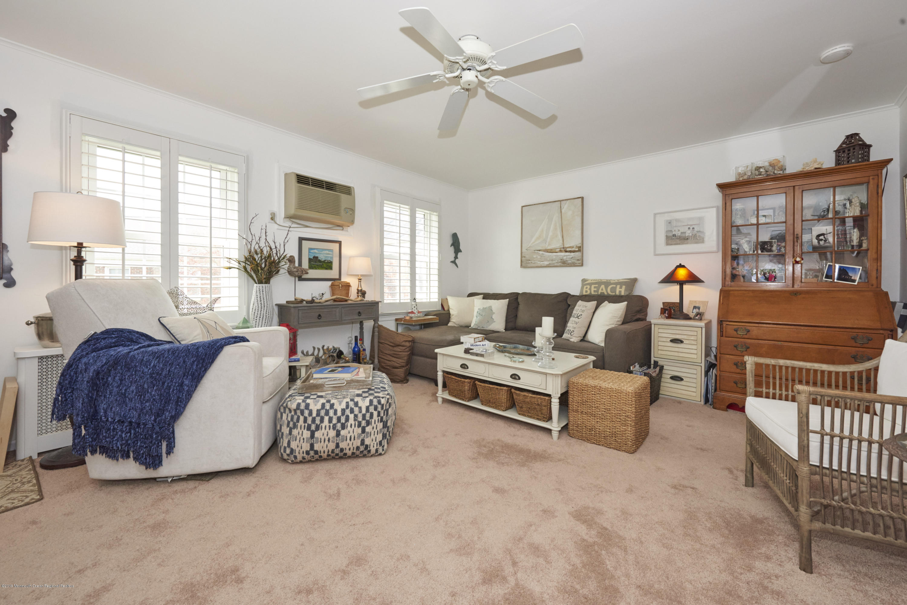 30 Pinckney Road, Unit C Red Bank, NJ 07701 - Photo 5 of 18 a living room with furniture and a window