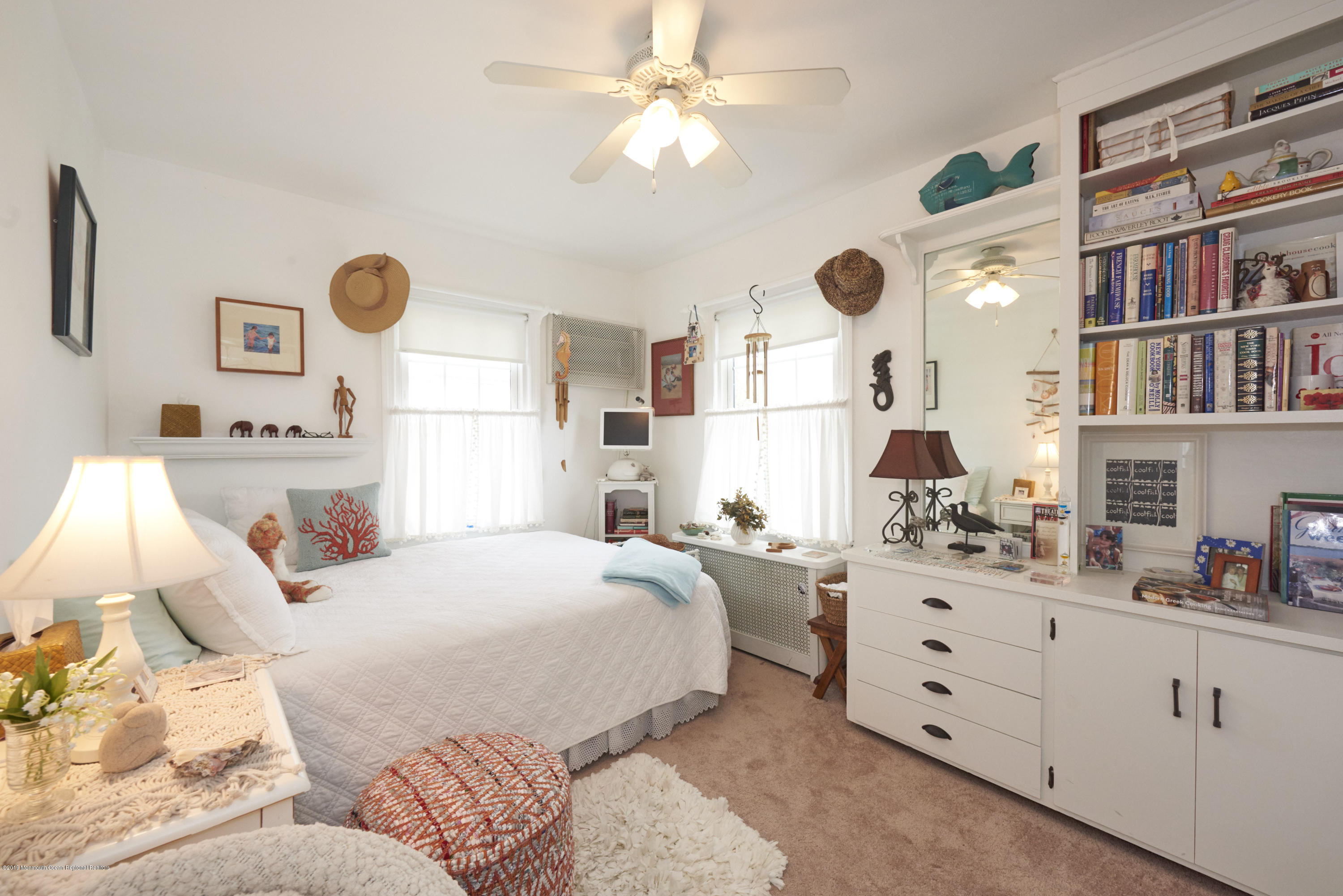 30 Pinckney Road, Unit C Red Bank, NJ 07701 - Photo 9 of 18 a bedroom with a bed and a window