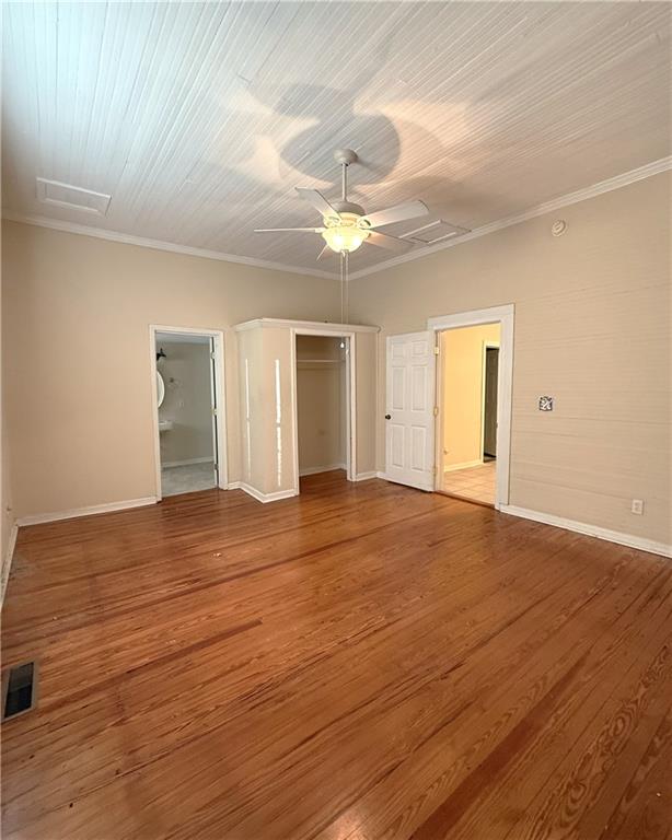 1740 Spring Street Northeast Conyers, GA 30012 - Photo 12 of 23 a view of empty room with wooden floor and fan