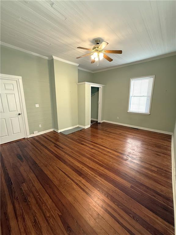1740 Spring Street Northeast Conyers, GA 30012 - Photo 14 of 23 a bedroom with a bed and wooden floor