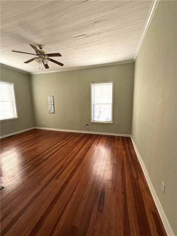 1740 Spring Street Northeast Conyers, GA 30012 - Photo 16 of 23 wooden floor in an empty room with a window