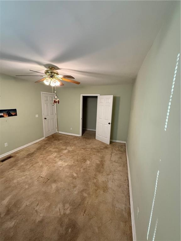 1740 Spring Street Northeast Conyers, GA 30012 - Photo 19 of 23 a view of an empty room