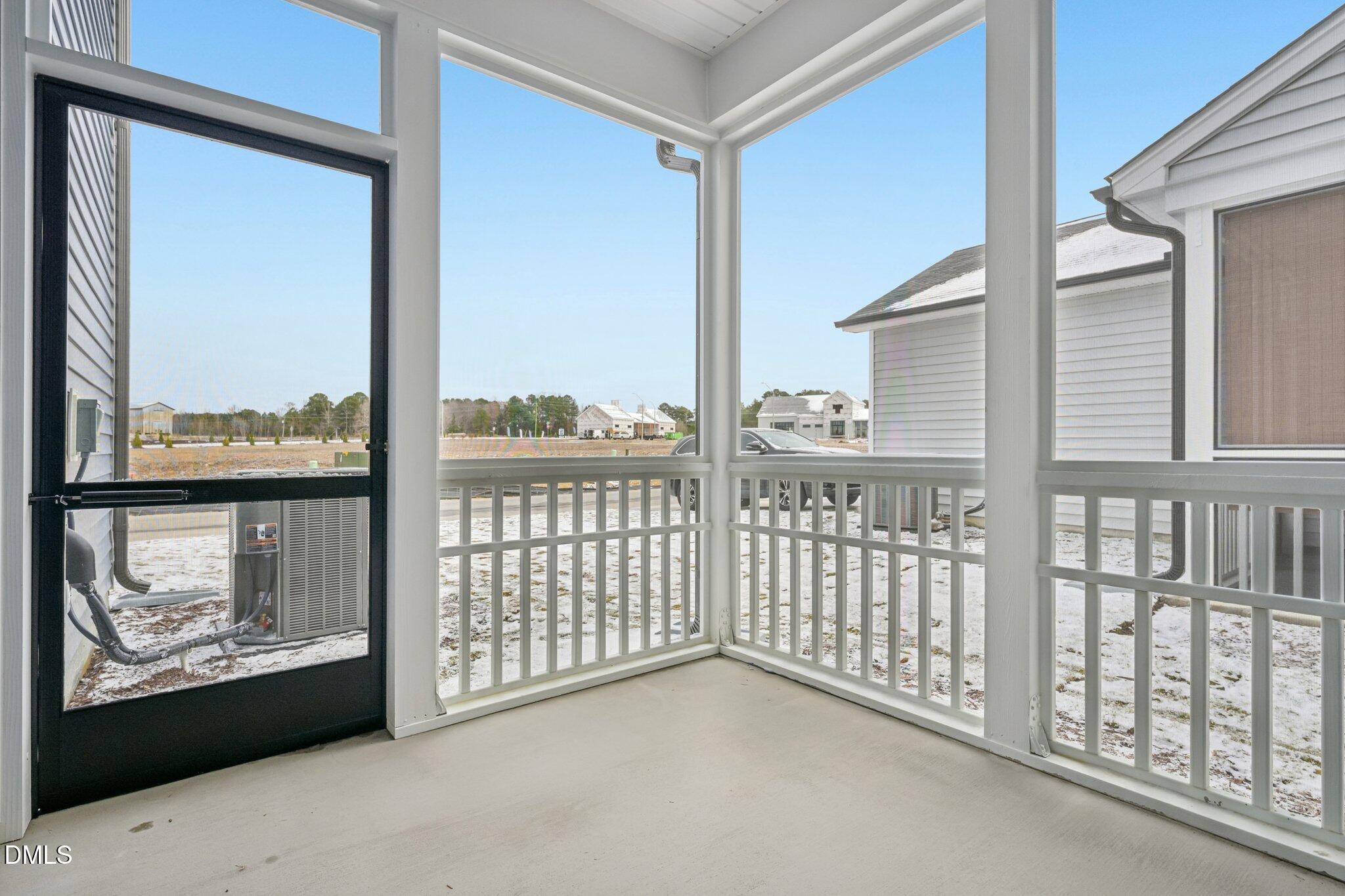 309 Marvel Drive, Unit 147 Rolesville, NC 27571 - Photo 27 of 39 a view of a balcony with an outdoor space