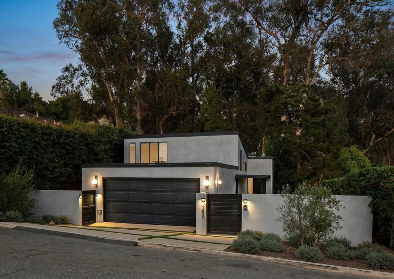 front view of a house with a small yard