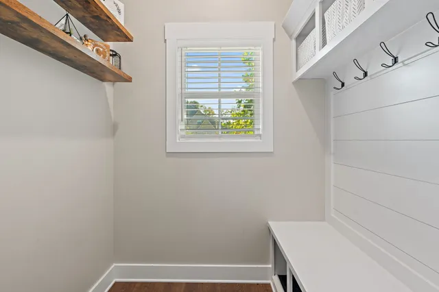 a bathroom with a bathtub and window