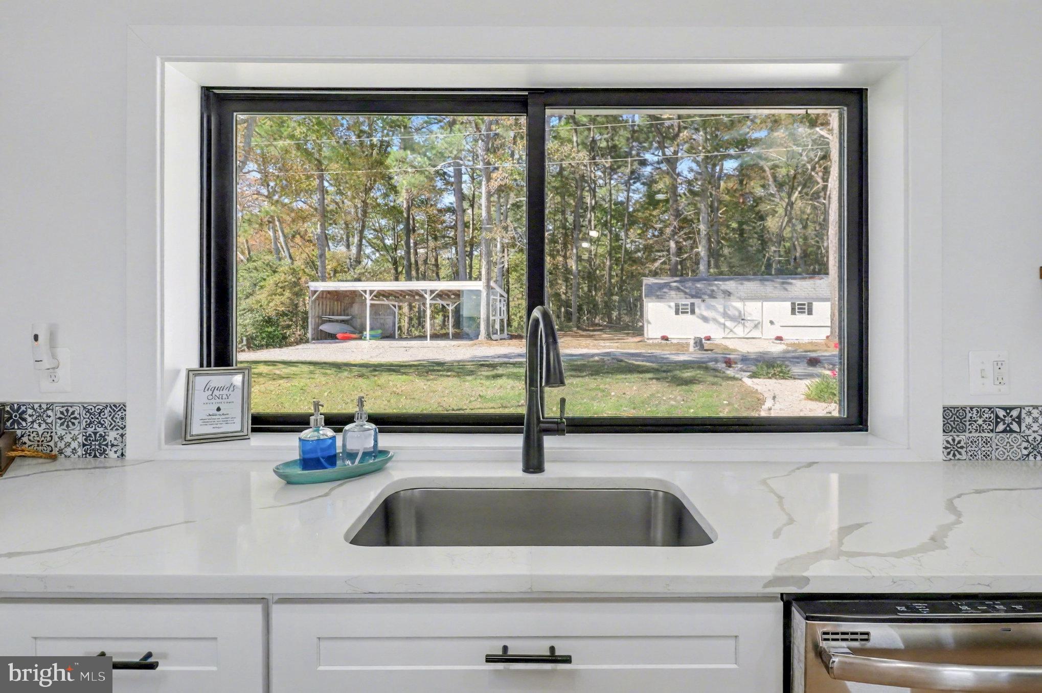 160 Shipwatch Lane Reedville, VA 22539 - Photo 15 of 54 Wash dishes and watch the herons in the tidal pond