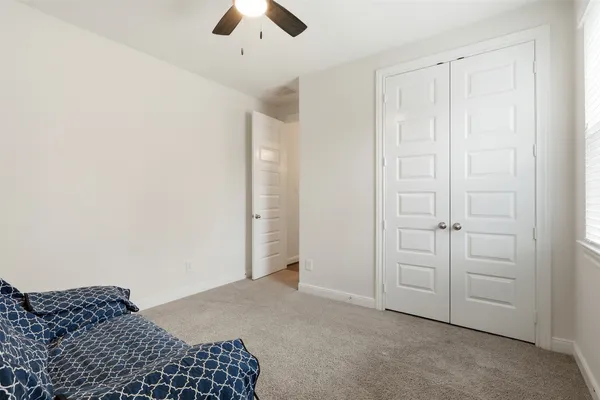 a view of a livingroom with furniture and a flat screen tv