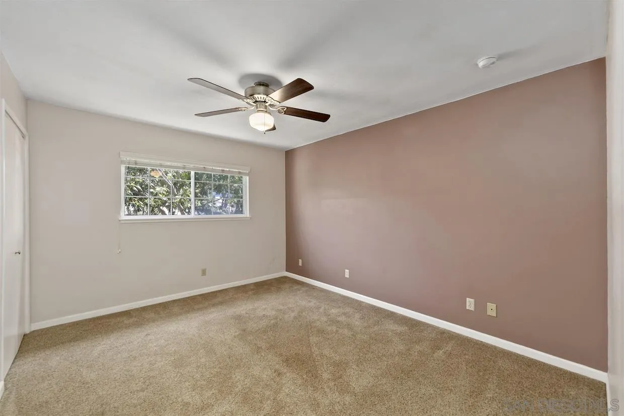 2602 Murray Ridge Road San Diego, CA 92123 - Photo 12 of 17 a view of an empty room with a window