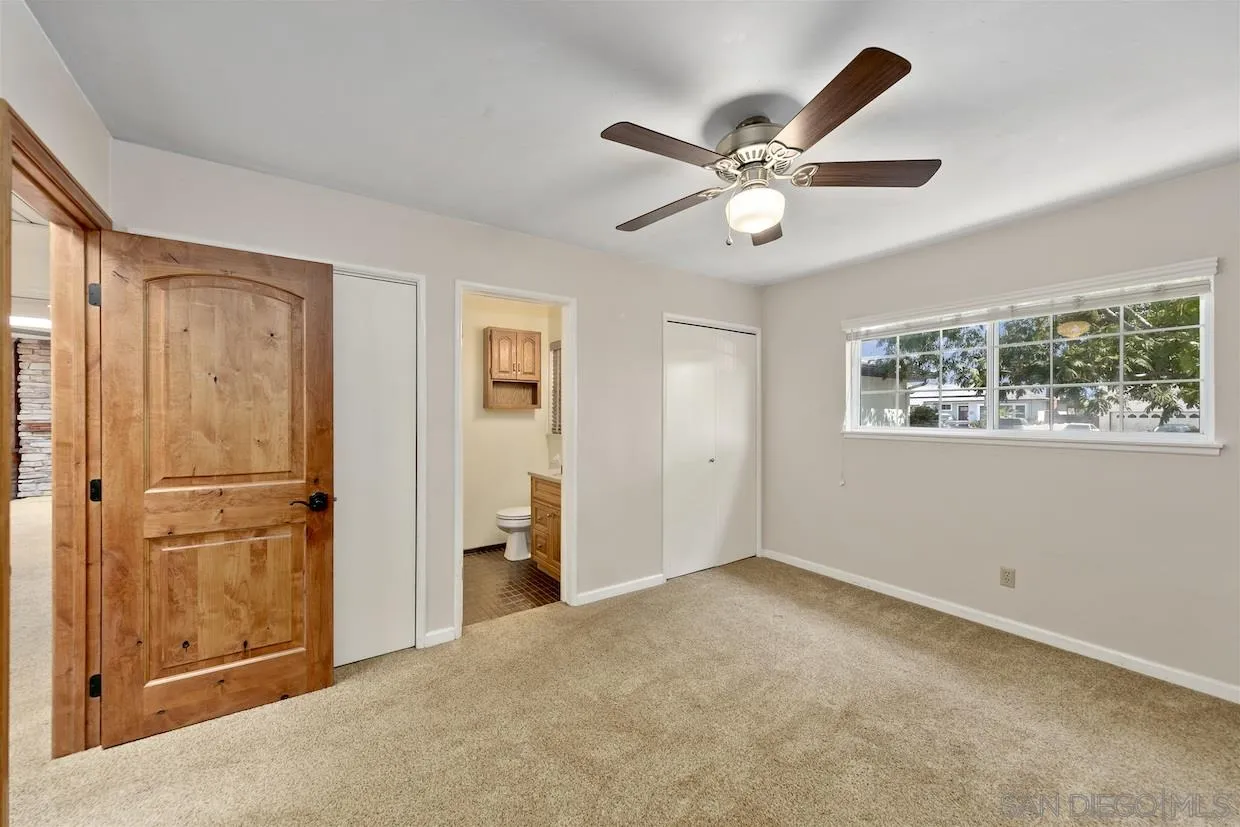 2602 Murray Ridge Road San Diego, CA 92123 - Photo 10 of 17 a view of an empty room with a window