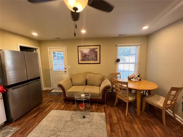 a bedroom with bed and window