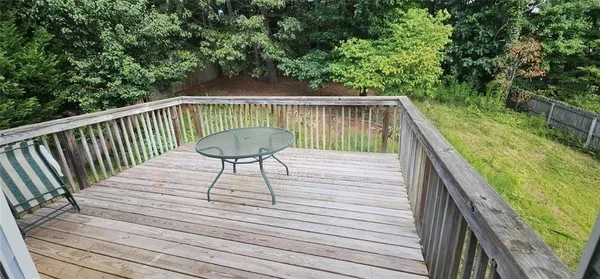 a view of a backyard with a garden and staircase