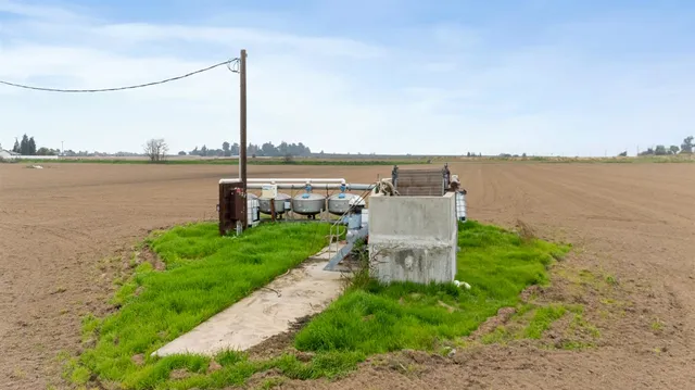 a garden view with a lake view