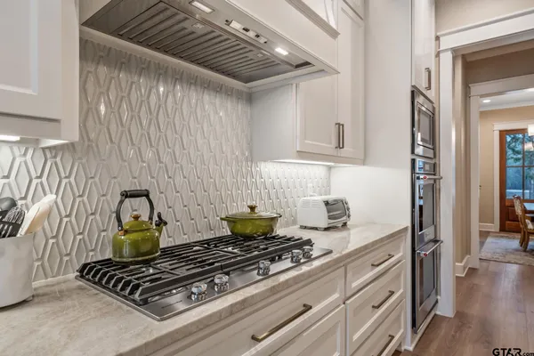 a utility room with sink dryer and washer