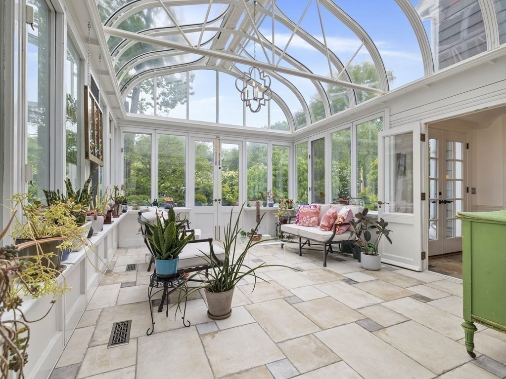 60 Damien Road Wellesley, MA 02481 - Photo 12 of 36 a living room with furniture and floor to ceiling windows