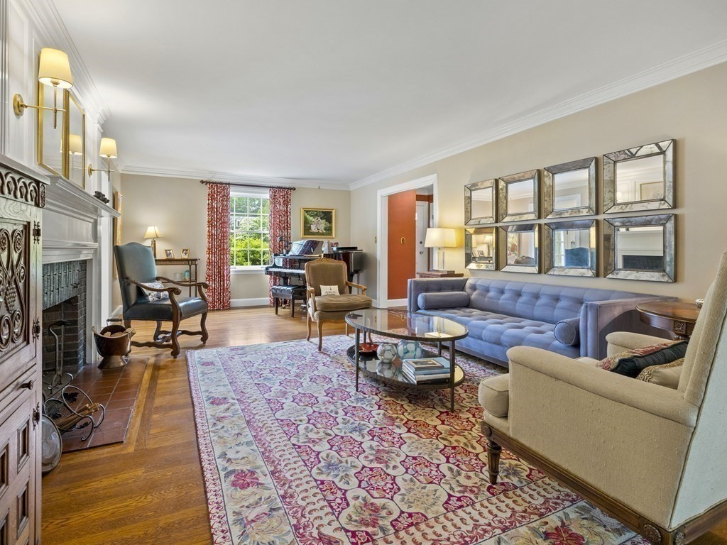 60 Damien Road Wellesley, MA 02481 - Photo 13 of 36 a living room with furniture and a fireplace