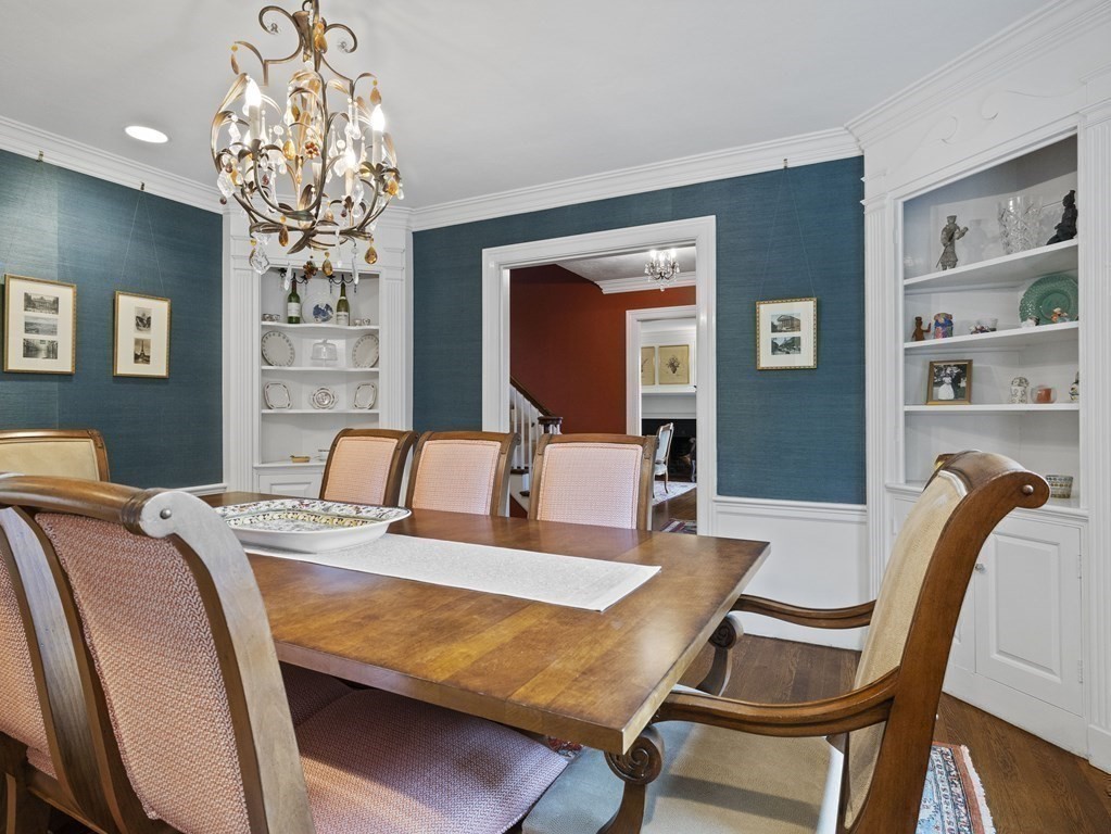 60 Damien Road Wellesley, MA 02481 - Photo 14 of 36 a bedroom with a bed and a chandelier