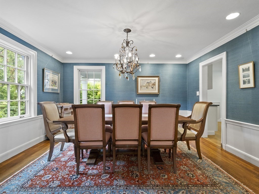 60 Damien Road Wellesley, MA 02481 - Photo 15 of 36 a dining room with furniture a rug and wooden floor
