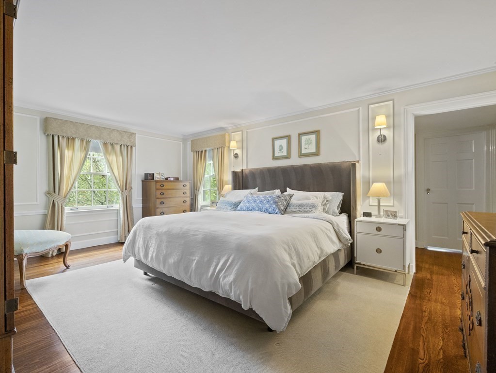 60 Damien Road Wellesley, MA 02481 - Photo 17 of 36 a spacious bedroom with a bed and a large window