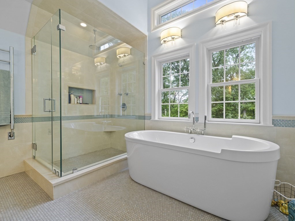 60 Damien Road Wellesley, MA 02481 - Photo 18 of 36 a bathroom with a bathtub and a shower