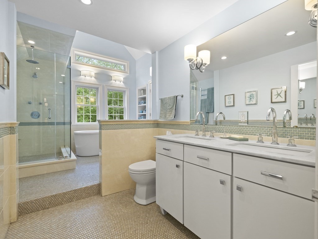 60 Damien Road Wellesley, MA 02481 - Photo 19 of 36 a spacious bathroom with a granite countertop sink toilet and shower