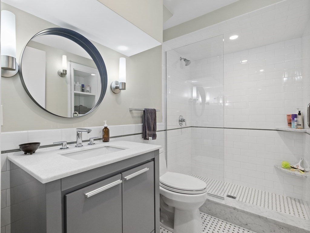 60 Damien Road Wellesley, MA 02481 - Photo 21 of 36 a bathroom with a sink and a mirror